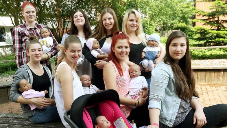 German Girls Being Conditioned To Be Mothers With Black Baby